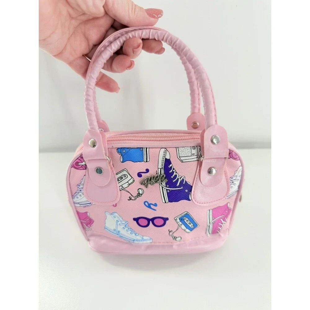 HCC Small/Mini Handbag pink with a print of sneakers, cameras, & cassette tapes